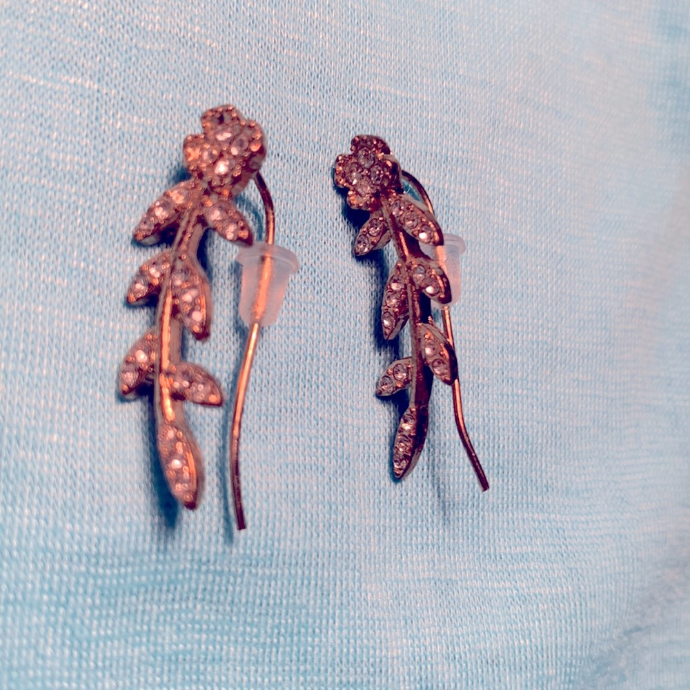 Gold tone earrings with cut stones